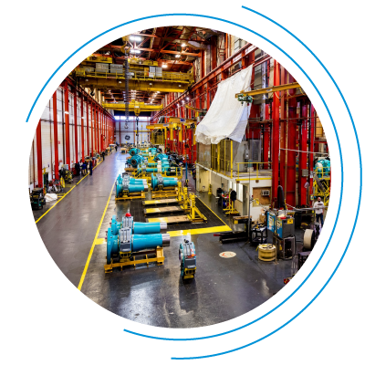 A man works to install solar panels into a large array