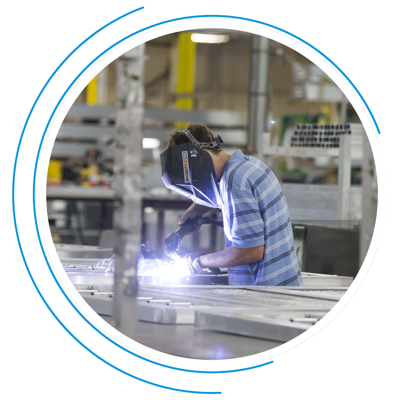 engineering employee welding metal in a factory engineering employee welding metal in a factory