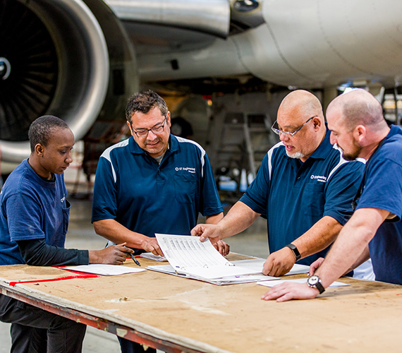 Aviation employees in Florida’s workforce construct an fairplane’s outer shell Aviation employees in Florida’s workforce construct an fairplane’s outer shell